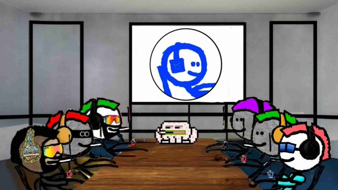 A pixel-art cartoon features several helmeted characters gathered around a table, with a blue smiling face projected on a screen behind them.