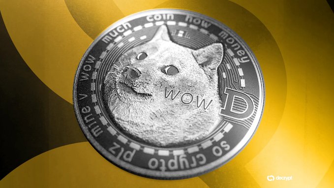 A physical commemorative Dogecoin (DOGE) silver coin featuring the Shiba Inu dog face and text including 'wow', 'much coin', 'how money', and 'so crypto to the moon'.
