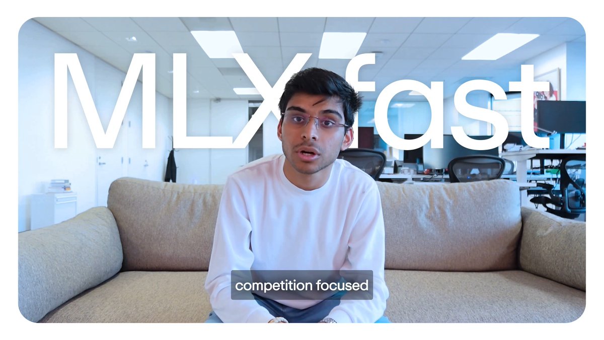 A young man with glasses sits on a beige couch in an office setting with the text "MILX feast" and "competition focused" overlaid.