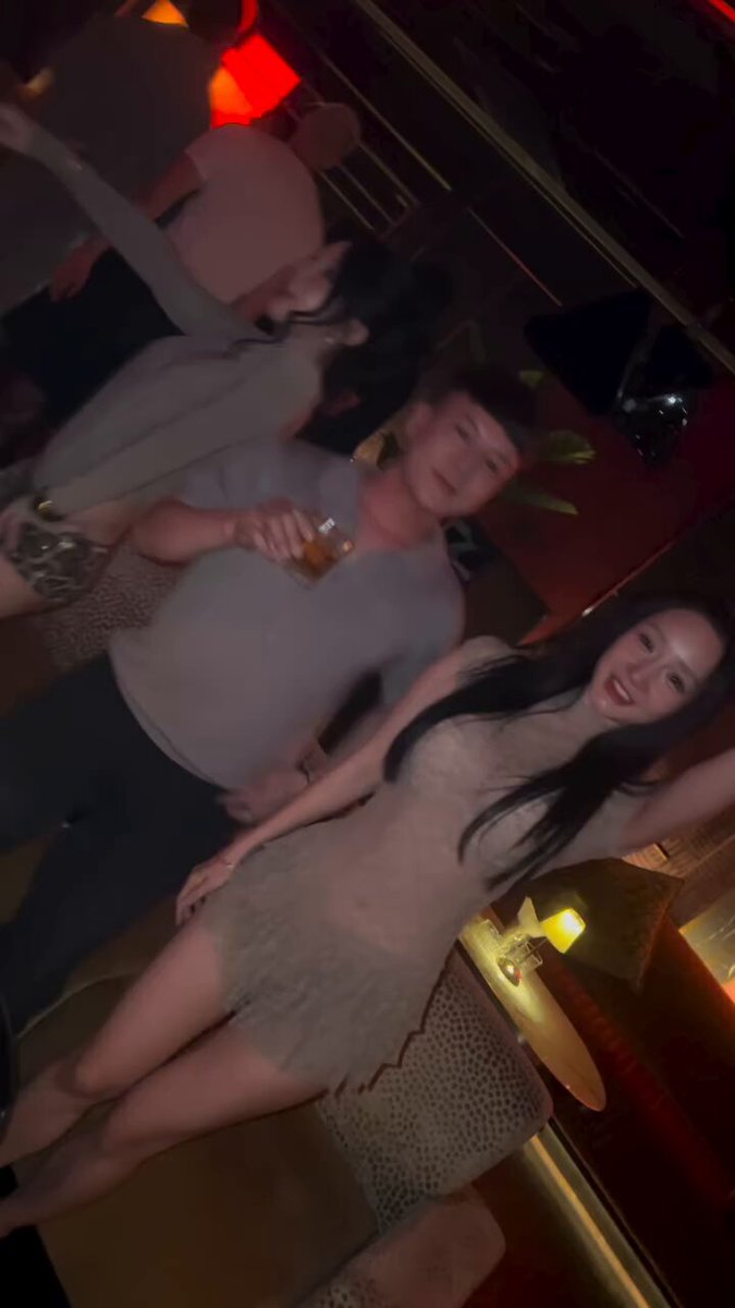 "Long Hype" is a popular social media platform where people share photos, videos, and other content with their friends or followers. The post in question features a man and woman posing together for a picture at a party. They are standing next to each other, smiling and holding drinks, which suggests that they might be enjoying themselves at the event. The image also includes a caption about Long Hype, indicating its relevance to the context of the photo.