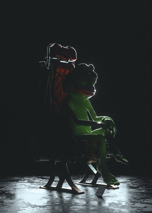 A dramatic image shows a green frog-like creature sitting in a wooden rocking chair against a black background, with strong rim lighting highlighting its silhouette.
