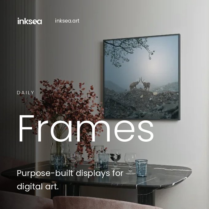 A promotional image for 'inksea.art' advertising 'Frames' as purpose-built displays for digital art, featuring a moody landscape photograph of two animals sparring mounted on a wall above a marble table with dried florals.