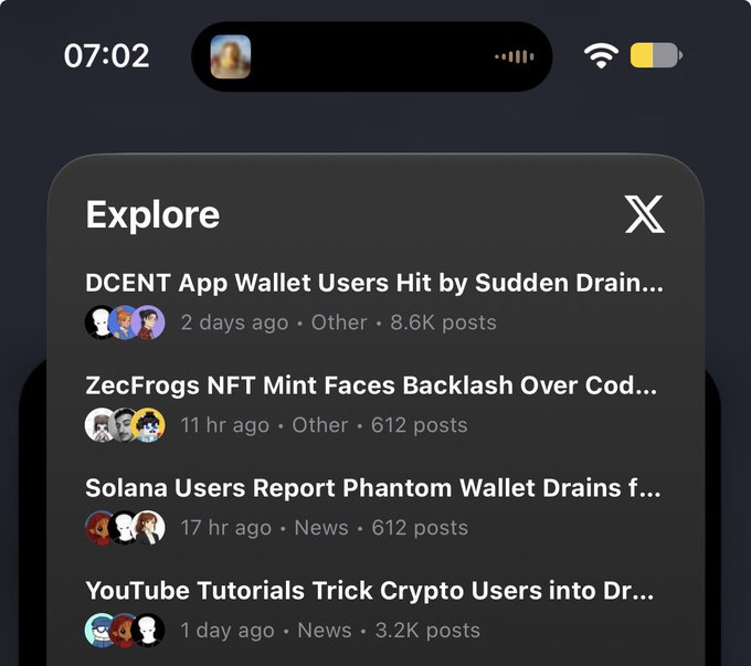 X (Twitter) mobile 'Explore' feed showing trending posts about crypto wallet drains: 'DCENT App Wallet Users Hit by Sudden Drain...', 'ZecFrogs NFT Mint Faces Backlash...', 'Solana Users Report Phantom Wallet Drains...', and 'YouTube Tutorials Trick Crypto Users into Drainers...'.