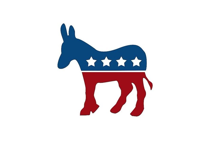 A silhouette of a Democratic Party donkey, rendered in red, white, and blue with four white stars, accompanies a post reporting that Senate Democrats are meeting to draft a counterproposal to the CLARITY Act ahead of a key 60-vote showdown.