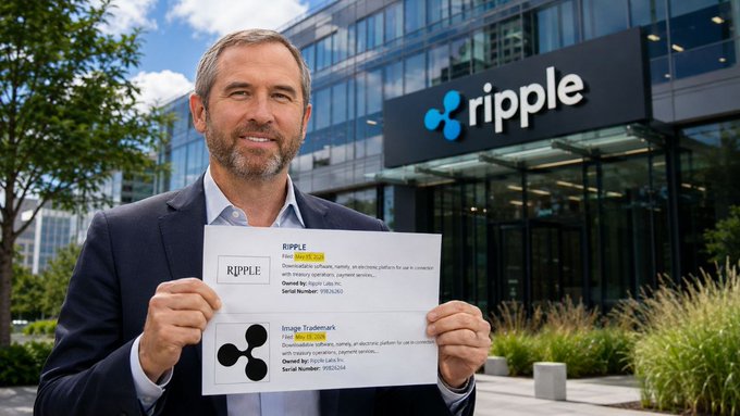 The image features a man holding up a piece of paper with Ripple written on it. The text on the paper seems to be related to cryptocurrency or digital asset management, as Ripple is known for its involvement in these areas. The man appears to be posing for the photo while displaying his paper, possibly indicating that he has some knowledge about Ripple and wants to share it with others.

The background of the image shows a building, which could be an office or a store related to Ripple's operations. There are also potted plants visible in the scene, adding a touch of greenery to the setting.