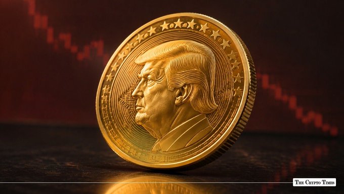 A gold coin featuring Donald Trump's profile, set against a dark background with a red downward-trending chart, watermarked 'The Crypto Times'.