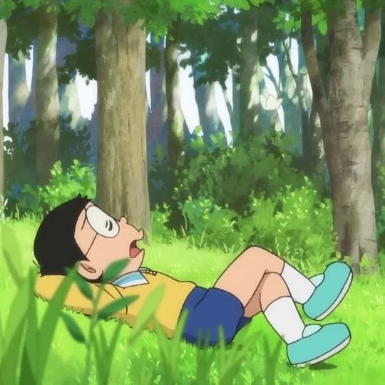 A character from the anime Doraemon rests peacefully in a sun-dappled forest, hands behind their head, looking up with a relaxed expression. The peaceful, laid-back scene of enjoying nature pairs nicely with the post's appreciation for community members who take a moment to rest and recharge while contributing to the Web3 ecosystem.