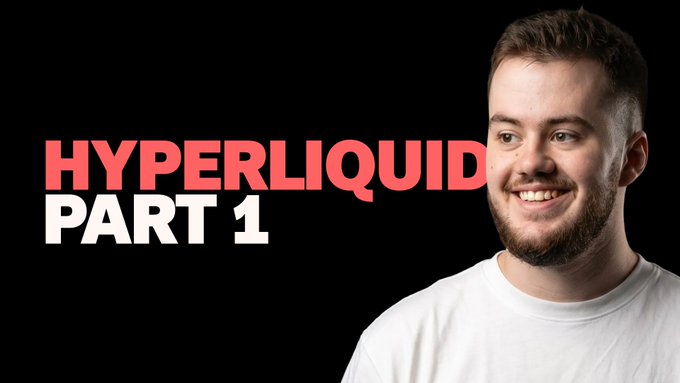 The image features a man wearing a white t-shirt with the words "HYPERLIDIUM" written above his head. The man has a beard, and he appears to be smiling at the camera. The background of the image is black, which makes the white text on the man's shirt stand out prominently.