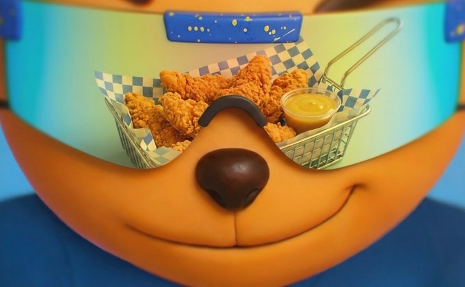 A 3D animated character (resembling Captain Rex/Clone Trooper) with a large orange mustache wearing futuristic blue-tinted visor goggles that reflect a basket of fried chicken with dipping sauce.