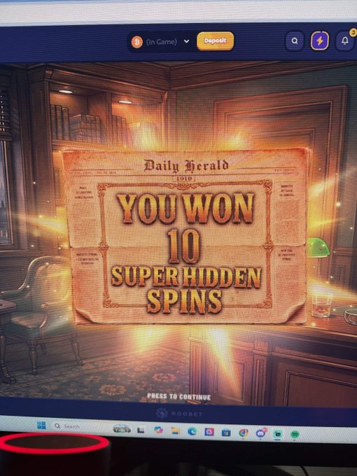 A computer monitor displays a slot game winning screen announcing "YOU WON 10 SUPER HIDDEN SPINS" on a vintage "Daily Herald 1919" themed graphic from RooBet Casino, captured from what appears to be streamer Rydurz's broadcast. The image ties into the post about a live Kick stream chasing losses on Tommy Gun, with the super hidden spin trigger likely being a moment of excitement shared with viewers.