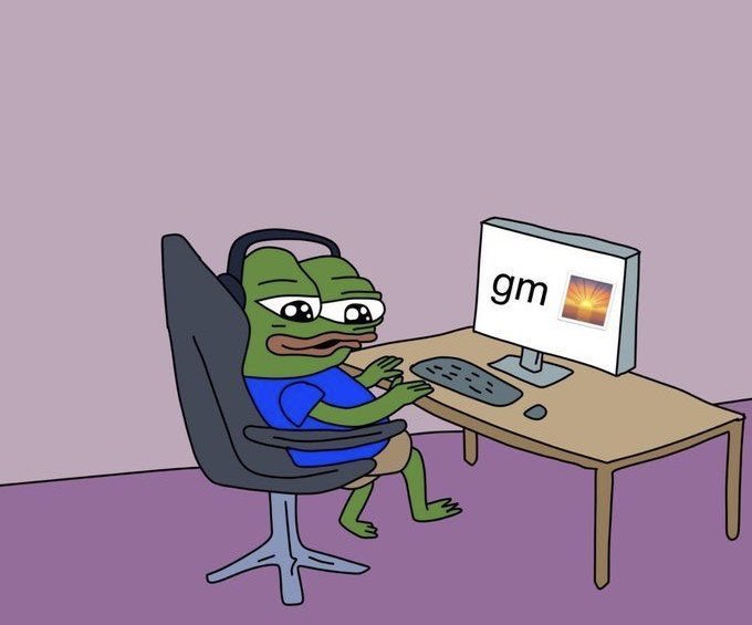 A cartoon of the Pepe the Frog character sitting at a desk with headphones on, typing at a computer displaying 'gm' with a sunrise image, representing the crypto 'gm' (good morning) culture.