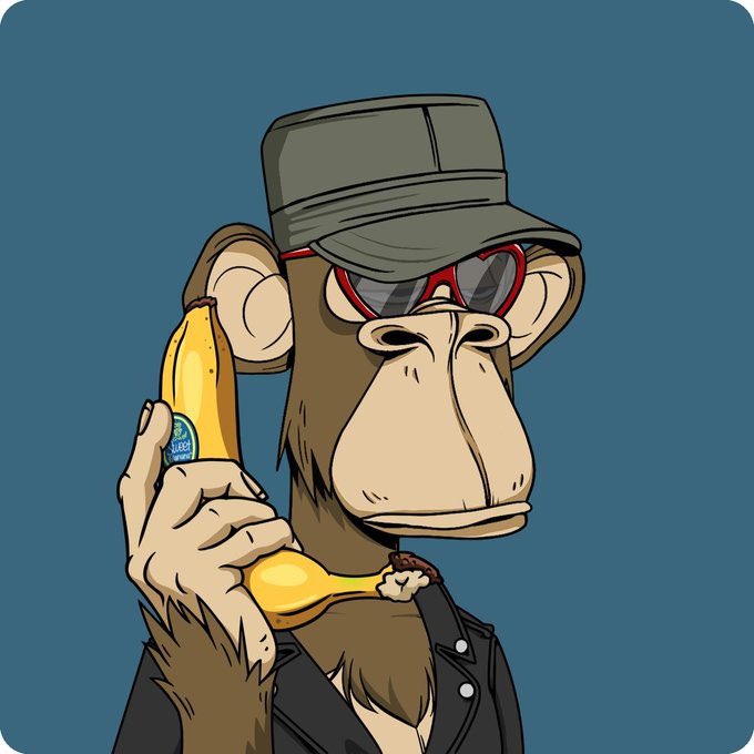 The image features a cartoon monkey wearing sunglasses, a hat, and a leather jacket while holding a banana over its head as if talking on a phone. The caption below the image reads "When I picked up this BAYC, I never thought I'd get to chat with the previous owner @KGeorgee who not only congratulated me, but sent over all the gifs and images he collected for it."