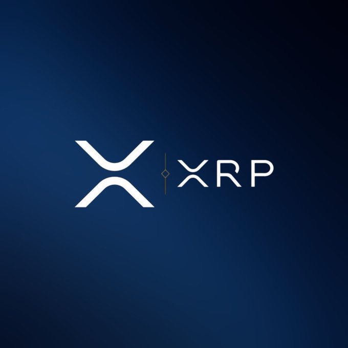 The image features a blue background with white text that reads "XRP". The text is centered, making it easy to read and understand. The words "XRP" are written in a larger font size than the rest of the image, which helps them stand out against the blue backdrop. The overall layout of the image suggests that it might be related to an article or post about Bitcoin or cryptocurrency, as indicated by the caption above the text.
