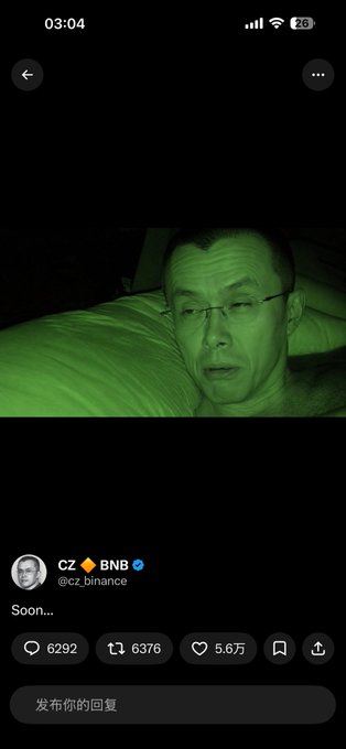 A screenshot of a tweet from CZ (@cz_binance) showing a selfie taken at 3:04 with a green tint, captioned 'Soon....', with 6,292 replies and 5.6万 likes.