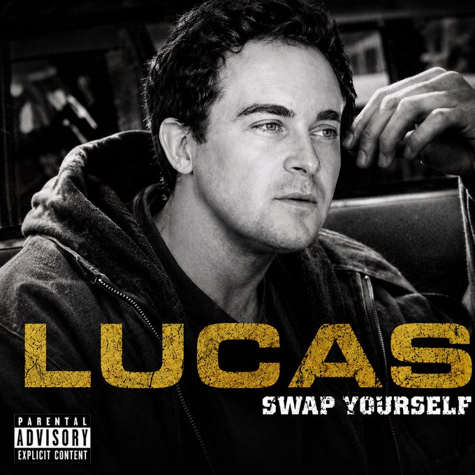 A stylized album or promotional cover featuring a black-and-white portrait of a young man with 'LUCAS' in large yellow letters and 'SWAP YOURSELF' below, marked with a Parental Advisory Explicit Content label.