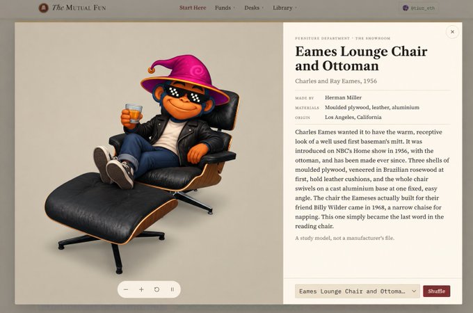 A webpage from "The Mutual Fun" featuring a stylized orange character in a pink wizard hat and pixel sunglasses holding a drink while lounging in an Eames Lounge Chair and Ottoman (1956 by Charles and Ray Eames, made by Herman Miller), with shuffle button.
