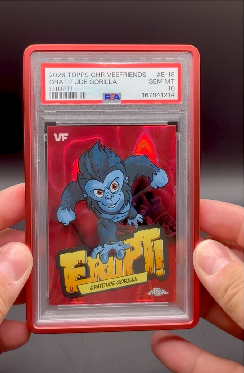 A graded PSA 10 trading card encased in a protective holder, labeled '2026 TOPPS CHR VEEFRIENDS GRATITUDE GORILLA #E-18 GEM MT', featuring an illustration of a blue gorilla character with 'ERUPT!' text on a red background.