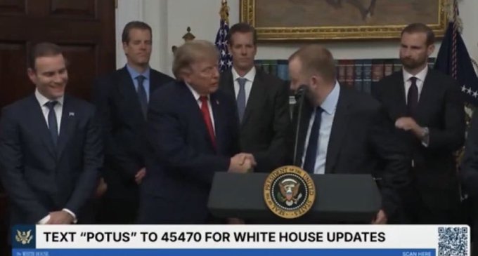 The image shows a press conference in the White House where President Trump shakes hands with a man at the podium bearing the presidential seal, surrounded by several other suited men, with a Fox News banner encouraging viewers to text "POTUS" to 45470 for White House updates. The caption humorously references the post by alluding to a "bald Brian" figure, possibly joking about the shaved-head appearance of one of the men at the event in relation to corporate or tech leadership imagery.

**Text visible:** "TEXT 'POTUS' TO 45470 FOR WHITE HOUSE UPDATES" and "SCAN HERE"