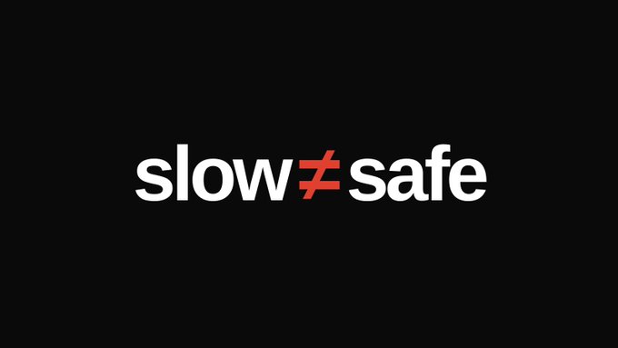 A text-based logo on a black background reading "slow ≠ safe," with the "not equal to" symbol in red.