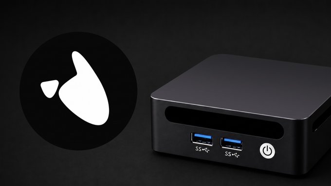 A promotional image featuring a black Bitcoin logo next to a compact black mini PC with USB ports and a power button.