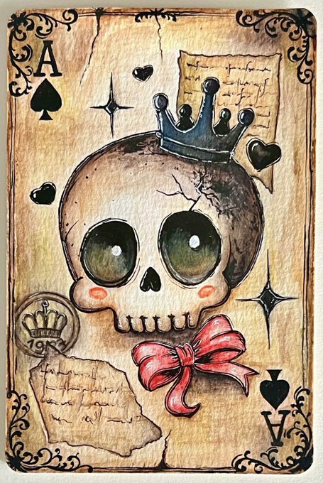 The image features an illustration of a skull with a crown, a red ribbon around its neck, and a book titled "Ace of Spades" written above it. The text "Too cute to be a warning" is also present on the image.