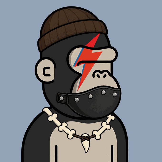 The image features a cartoon depiction of a gorilla wearing a hat, necklace, and a leather muzzle with spikes. The gorilla has a bandana covering its eyes and mouth, giving it a rockstar appearance. The caption "Gm Apes" is written in white text at the bottom of the image.