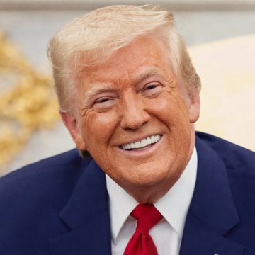 A smiling man with blonde hair wearing a dark suit and red tie is pictured in what appears to be a formal setting. The image relates to the post as it depicts Donald Trump, who as President would influence Federal Reserve policy and Treasury decisions that affect markets, stocks, crypto, and gold.