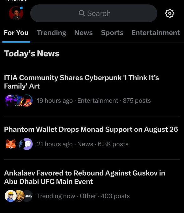 A social media 'For You' feed showing headlines including 'ITIA Community Shares Cyberpunk 'I Think It's Family' Art', 'Phantom Wallet Drops Monad Support on August 26', and 'Ankalaev Favored to Rebound Against Guskov in Abu Dhabi UFC Main Event'.