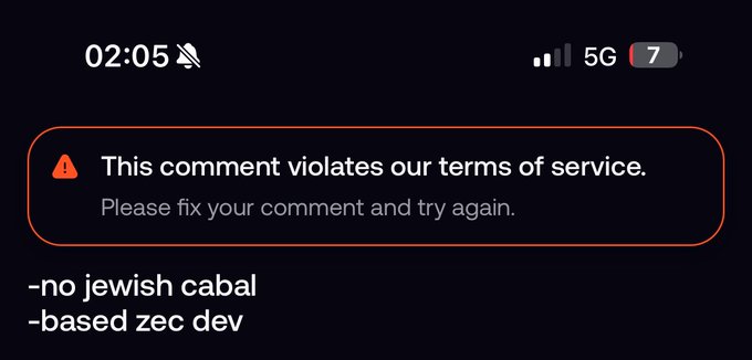 A mobile screenshot showing an Instagram comment violation notice reading 'This comment violates our terms of service' over a user comment containing text that includes references to 'jewish cabal' and 'based zec dev'.