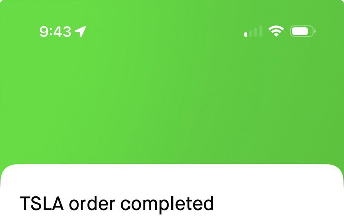 The image shows a green background with white text that reads "A Order completed" at the bottom of the screen, along with some numbers and symbols. The text appears to be related to an order for Tesla or SpaceX products, possibly from a company like Tesla Motors or Space X.