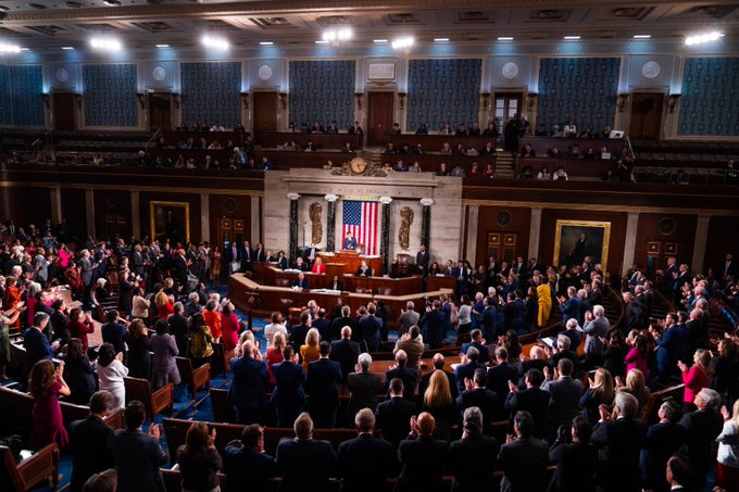 Members of the U.S. House of Representatives stand and applaud in the ornate chamber during a joint session of Congress, with the speaker visible at the podium before an American flag.

The image depicts Congress, the legislative body that, along with regulatory agencies like the CFTC mentioned in the post, shapes financial and crypto policy in the United States.