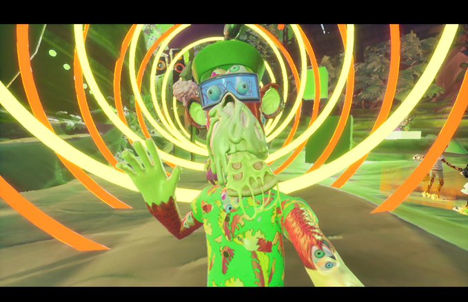 A screenshot from a video game or animation features a green, textured character wearing a cap and goggles, with a hand raised, surrounded by glowing, swirling yellow and orange energy lines.
