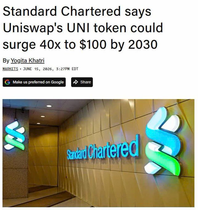 The image features a building with two signs displayed prominently, both of which have "Standard Chartered" written below them. One sign is slightly larger than the other, but they are equal in prominence. These signs indicate that the image was taken at the Standard Chartered office or within its premises on June 15th, at 2:30 pm. The background of the building appears to be a wall adorned with multiple lights and text, providing additional context for the location and time when the photo was captured.