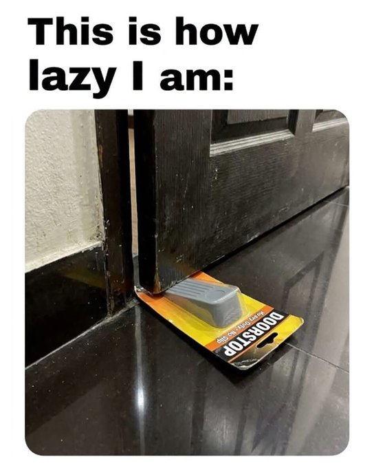 A meme image captioned 'This is how lazy I am:' showing a doorstop package being used to prop open a door.