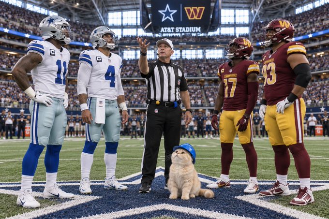 Two Dallas Cowboys players (#11 and #4) and two Washington Commanders players (#17 and #93) watch as a referee tosses a coin at midfield at AT&T Stadium, while a cat wearing a blue cap sits ready to call the flip. The cat's prepared "I call tails" captures the playful anticipation of the pregame coin toss.