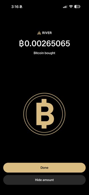 A River app confirmation screen showing "฿0.00265065 Bitcoin bought" alongside the Bitcoin logo, with "Done" and "Hide amount" buttons at the bottom. The image illustrates the poster's commitment to steadily accumulating Bitcoin during a dip, as mentioned in the accompanying text.