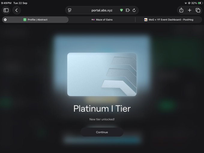 A screenshot from portal.abs.xyz showing a 'Platinum I Tier' achievement unlocked notification with a silver/platinum tier card design on a dark background.