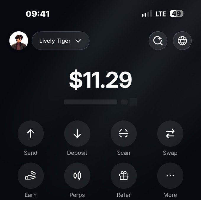 The image shows a cryptocurrency wallet app interface with a balance of $11.29 displayed for a user named "Lively Tiger," featuring action buttons for Send, Deposit, Scan, Swap, Earn, Perps, Refer, and More. This relates to the post, as the user is attempting to send $11.29 from this wallet, which falls far short of the $550 they're trying to move.