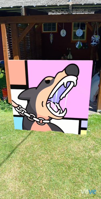 The image features a cartoon dog with its mouth open, showing off its teeth as if it's saying "ouch!". The dog appears to be sitting on a chain link fence or a wooden structure, possibly an art piece that has been painted by @doodles DOG artistically.

The post about the painting includes a caption that reads "@doodles DOG is so clean". This means that someone has taken a photo of the dog and posted it online with a caption expressing their admiration for the artwork.