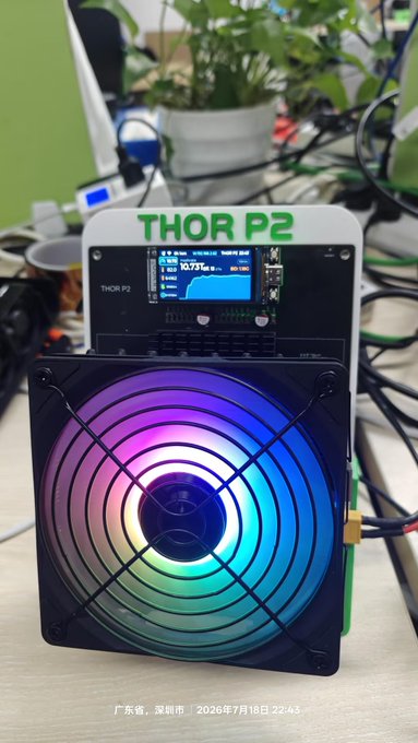 The image showcases a **THOR P2** crypto mining device featuring an RGB-illuminated cooling fan and a digital display showing a hashrate of **10.77 TH/s**, aligning with the post's description of next-generation silicon and high-efficiency ASIC technology powering the new Thor Series.