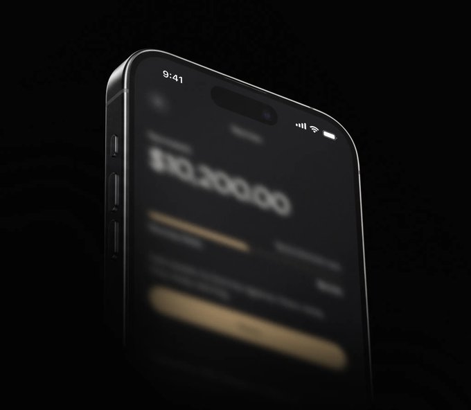 A sleek black smartphone displays a gold-accented app interface showing a balance of $103,200.00, teasing the upcoming major release mentioned in the post about ether.fi Cash.