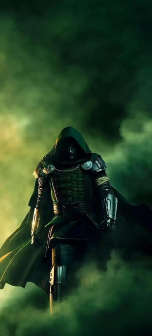 A hooded figure in dark armor and a cape stands amidst a green, smoky atmosphere.