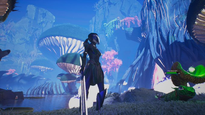 A video game screenshot featuring an armored character standing in a vibrant, bioluminescent alien landscape with glowing mushrooms, pink foliage, and blue water.