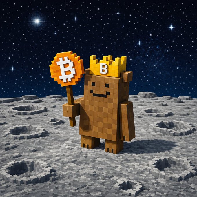 The image features a brown bear standing on a rocky surface, holding an orange Bitcoin sign with a gold crown above its head. The bear appears to be wearing a crown made of Lego bricks, adding a whimsical touch to the scene. The caption below the image reads "GM Stay #runejune".