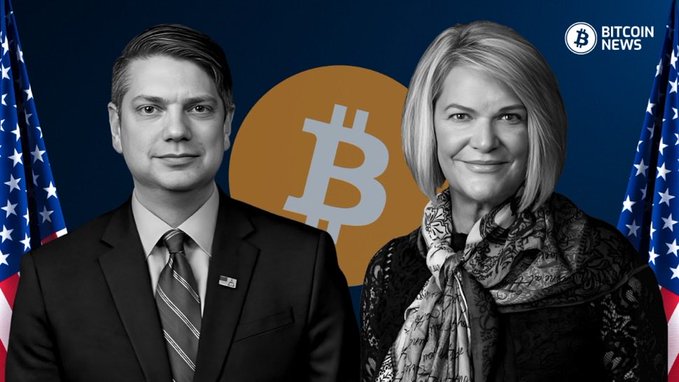 A black-and-white Bitcoin News thumbnail showing a man in a suit and a blonde woman in a scarf, posed in front of an orange Bitcoin logo and American flags.