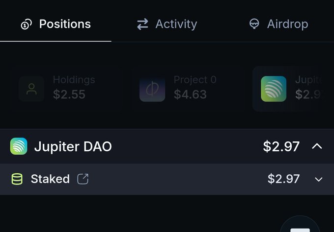 A crypto wallet interface displays a Jupiter DAO (Jup) position valued at $2.97, broken down as a staked amount of $2.97, alongside other holdings including Project 0 ($4.63) and a general Holdings balance ($2.55), confirming the small staked airdrop value the poster references.