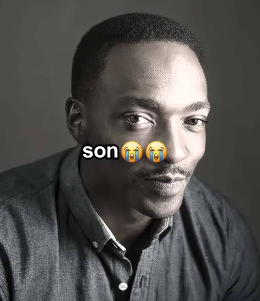A black-and-white portrait of a man in a button-up shirt with the text 'son' overlaid with two loudly crying face emojis covering part of his face.