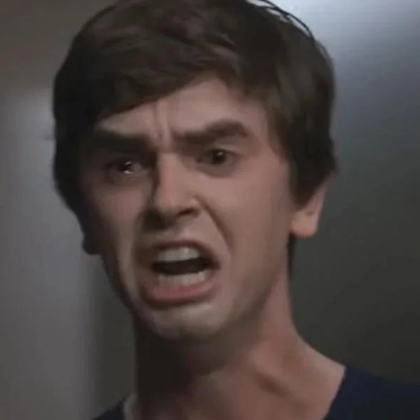 A close-up screenshot of actor Jim Carrey making a shocked, wide-mouthed facial expression.