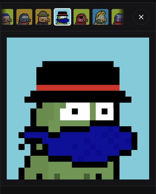 A pixel art profile picture selection screen showing a green-skinned figure wearing a black top hat with a red band and a blue coat.