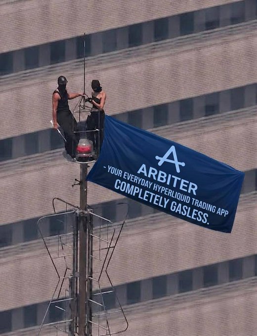 Two people in a cherry picker basket atop a tall building hanging a blue 'ARBITER' banner reading 'YOUR EVERYDAY HYPERLIQUID TRADING APP COMPLETELY GASLESS.'